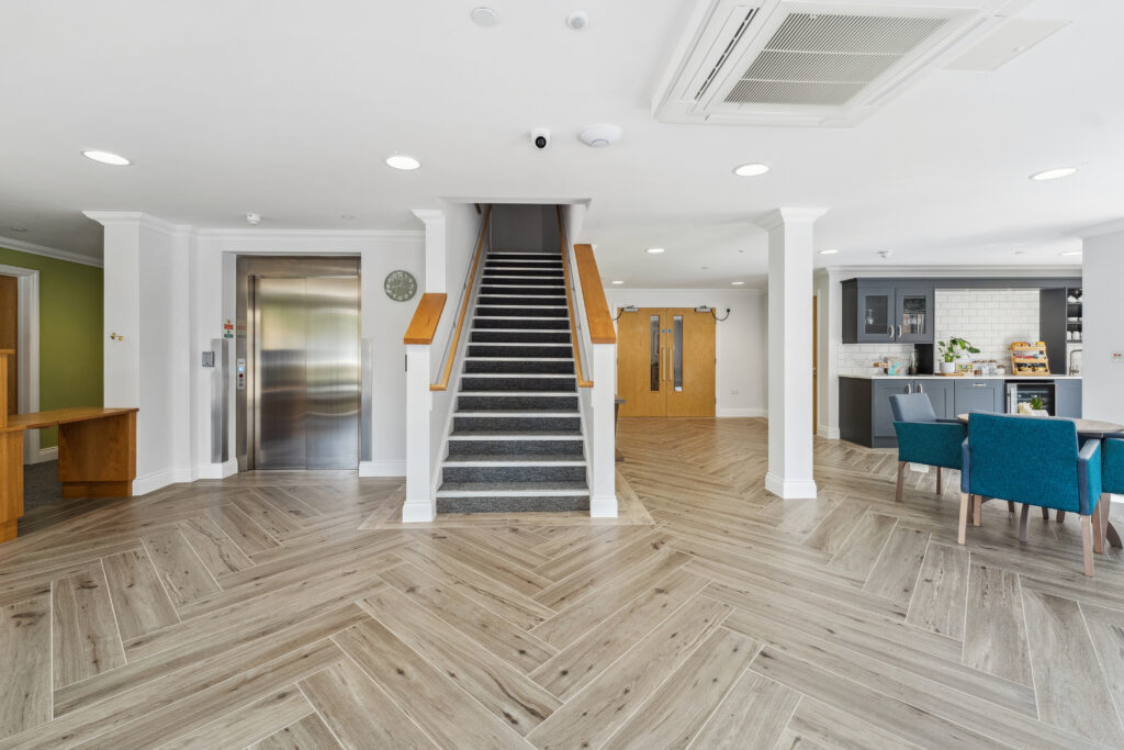 Ocean Heights stairs and lift in care home reception