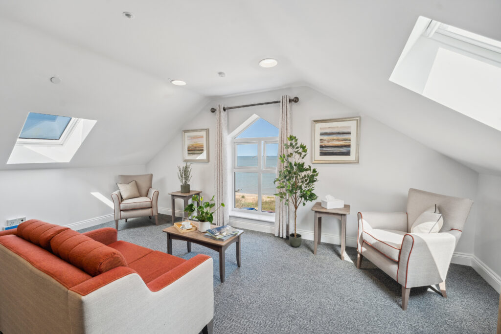 Ocean Heights Care Home couch with seaside view